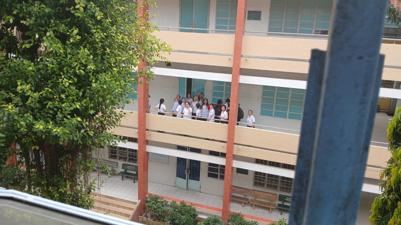 A group of friends is waving at you